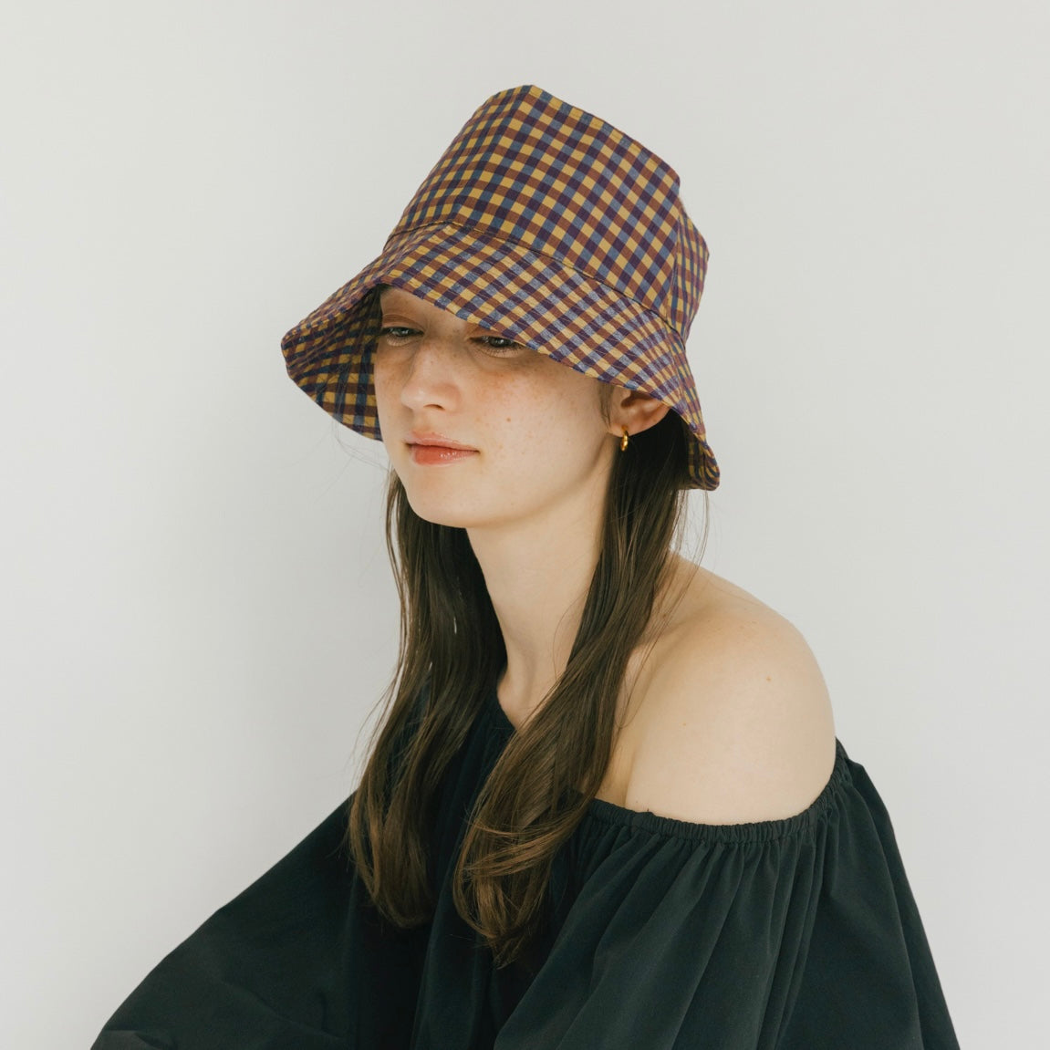 Sombrero de visera de cuadros