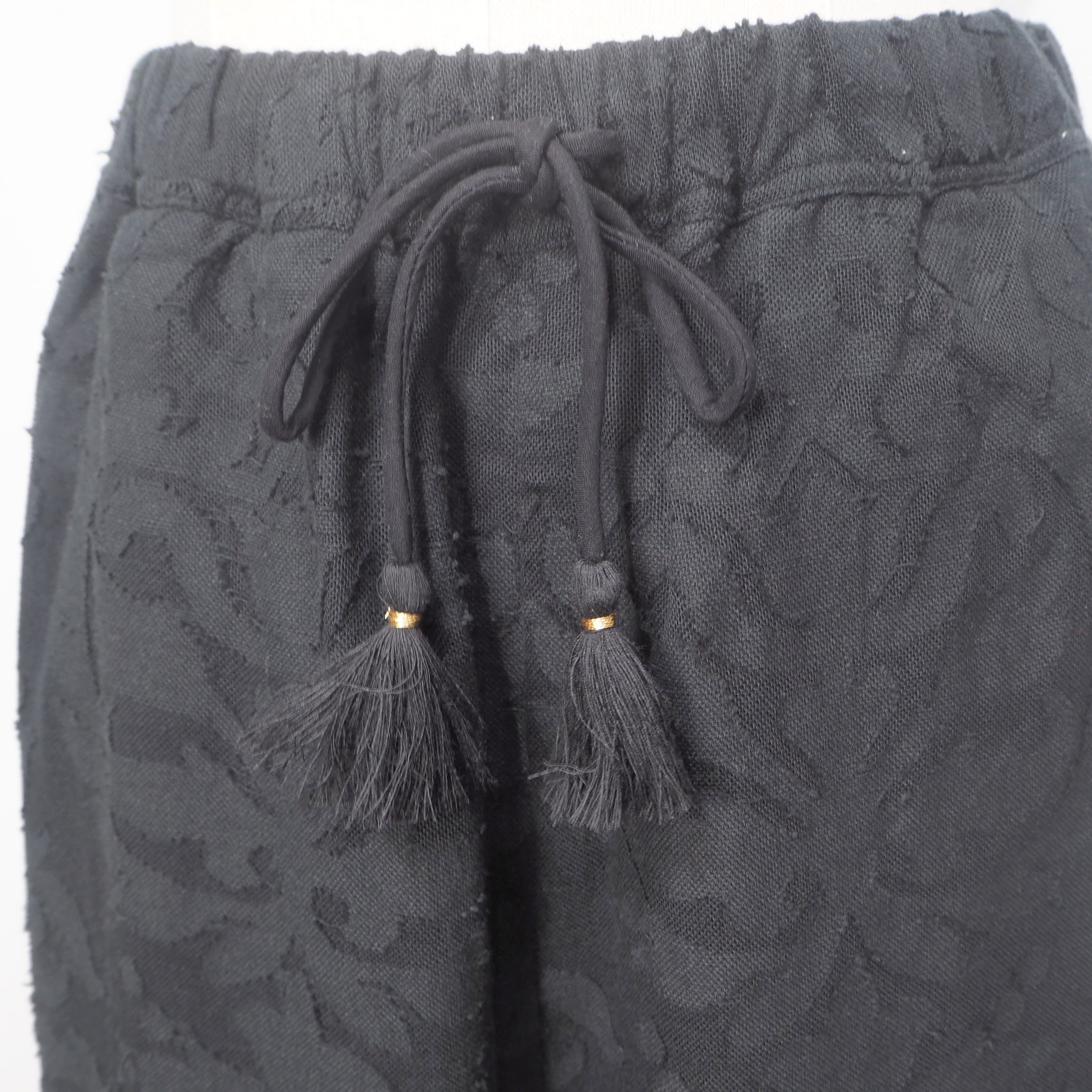 Pantalones de jacquard con encaje de la India